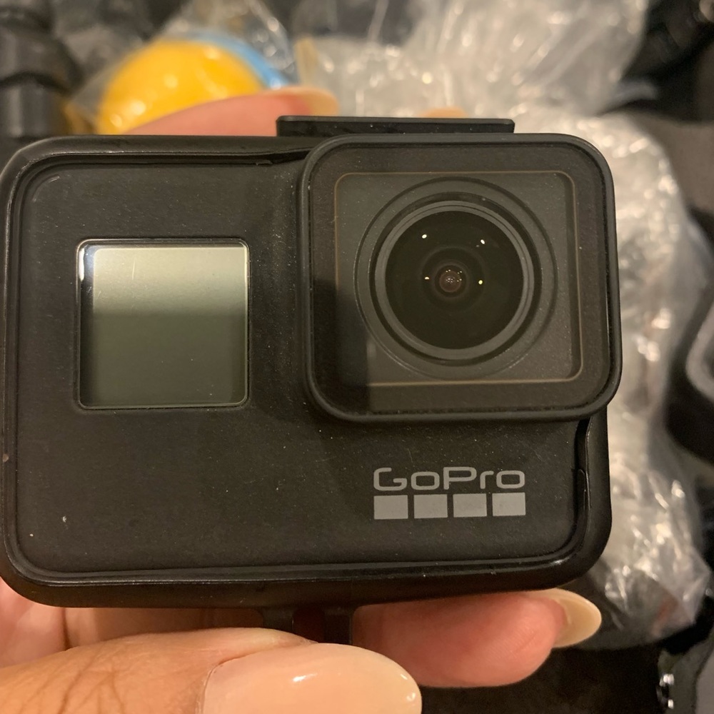 Gopro hero black 7 with sim card and accessories